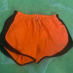Orange Nike shorts